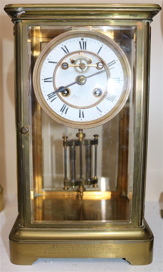 A Victorian brass four glass mantel clock, 12in.